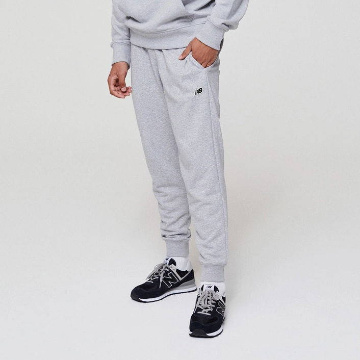 New Balance SPODNIE SMALL PACK MP23600AG